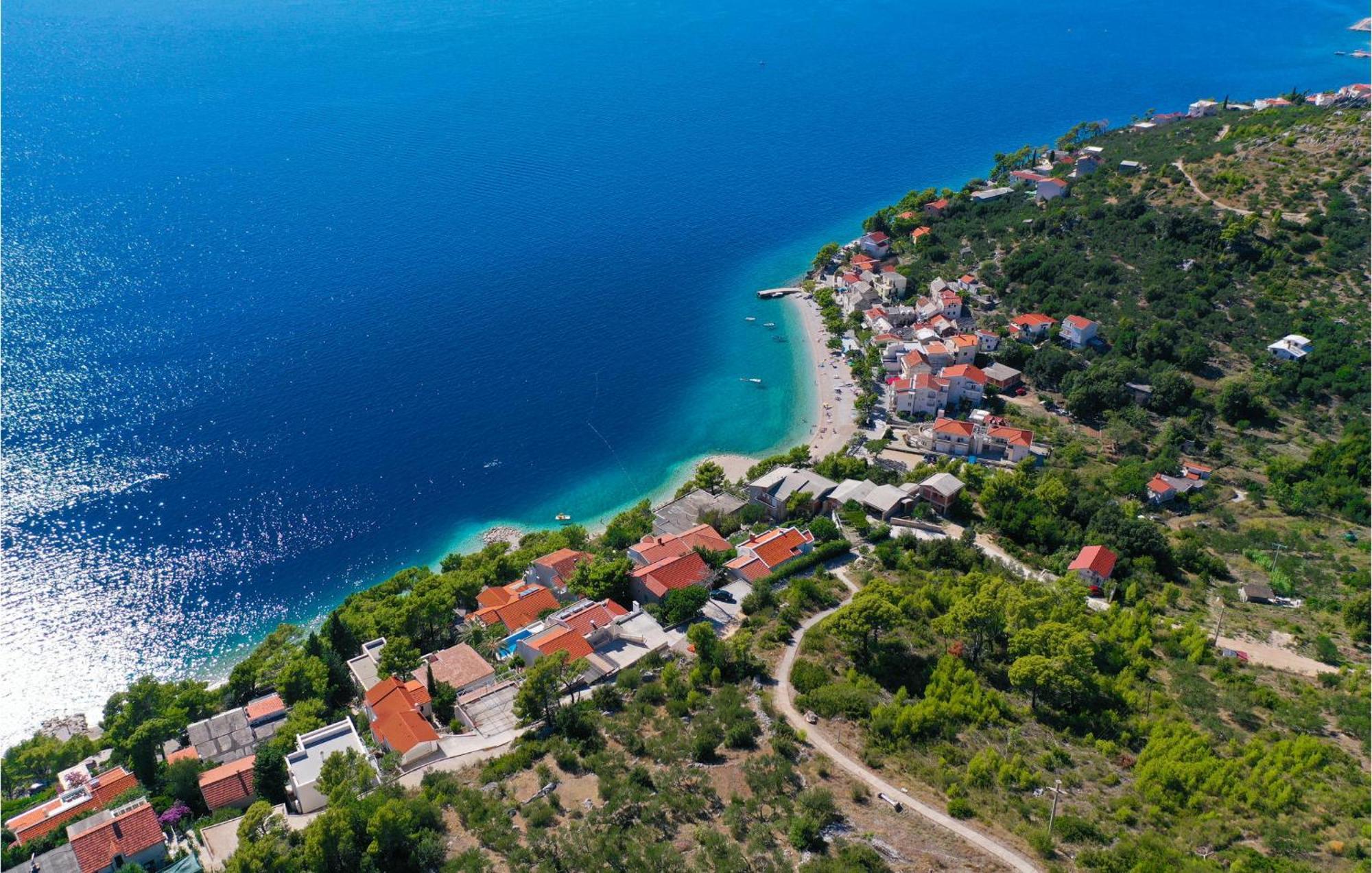 Nice Apartment In Krvavica With House Sea View 外观 照片