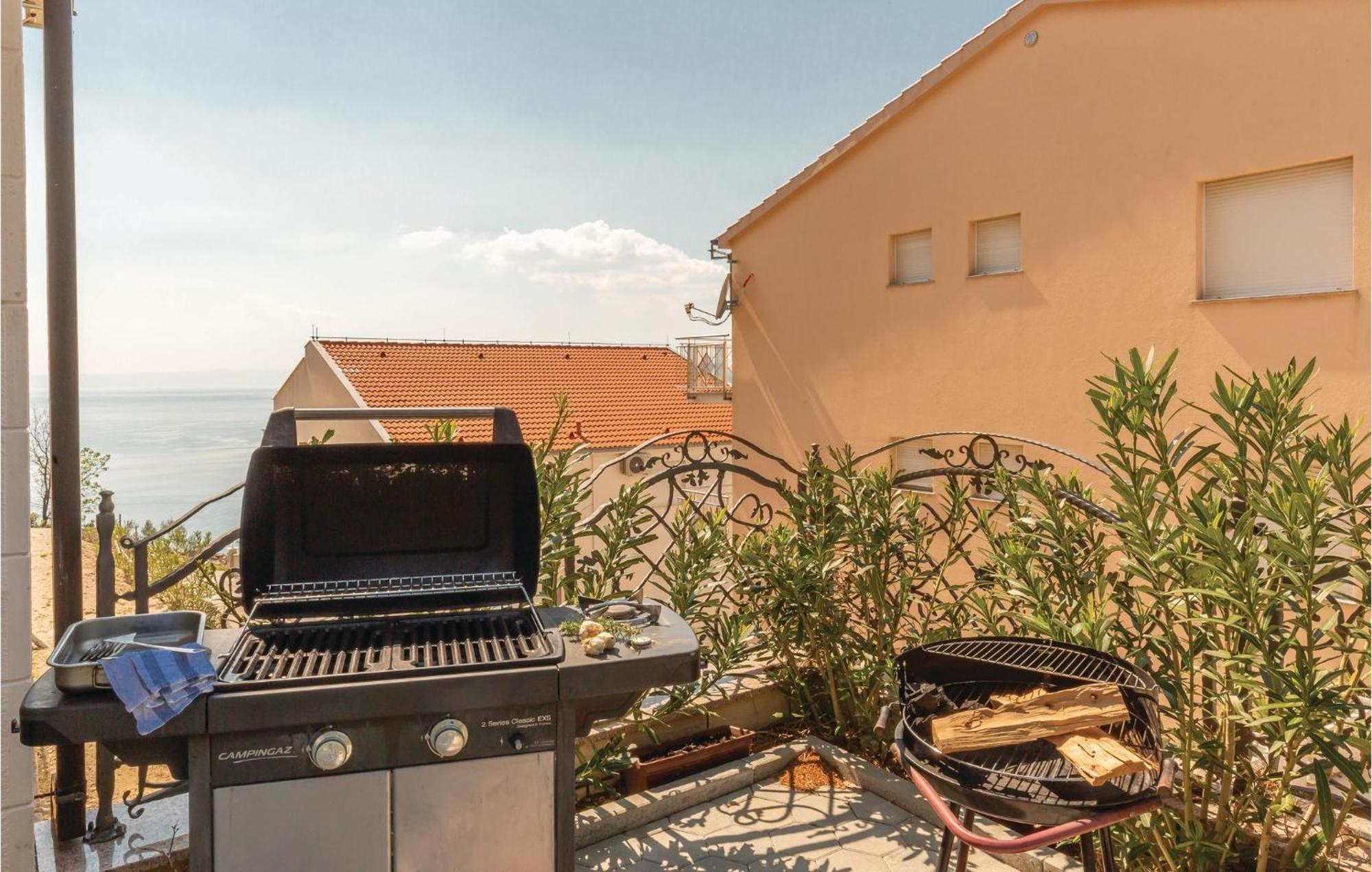 Nice Apartment In Krvavica With House Sea View 外观 照片