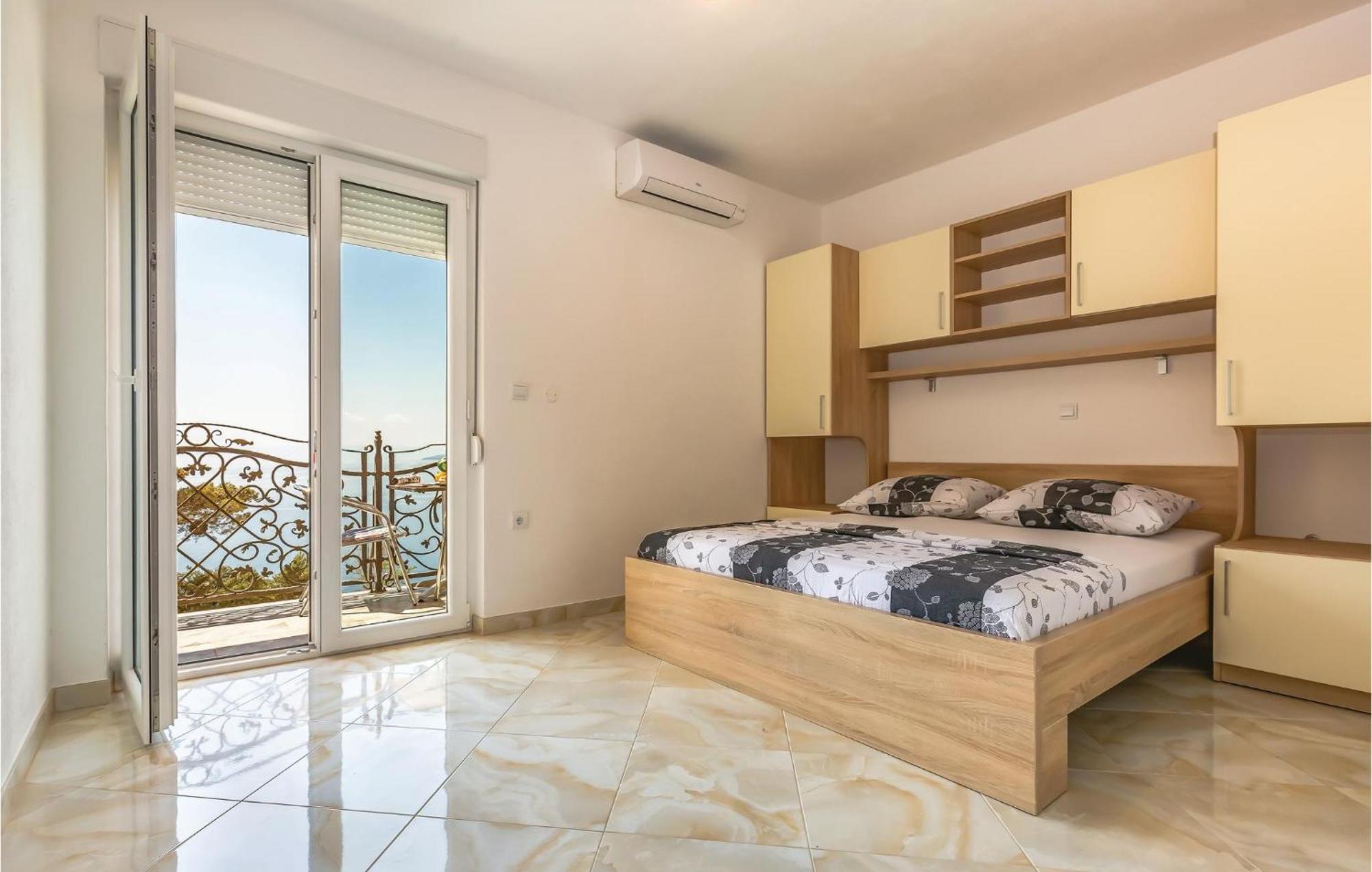 Nice Apartment In Krvavica With House Sea View 外观 照片